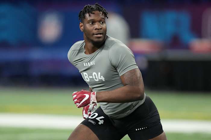 Chris Braswell runs and looks to the side at the combine